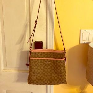 Pink and tan Coach crossbody.